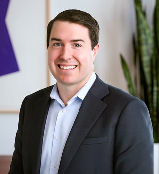 Portrait photo of Robbie Cahill